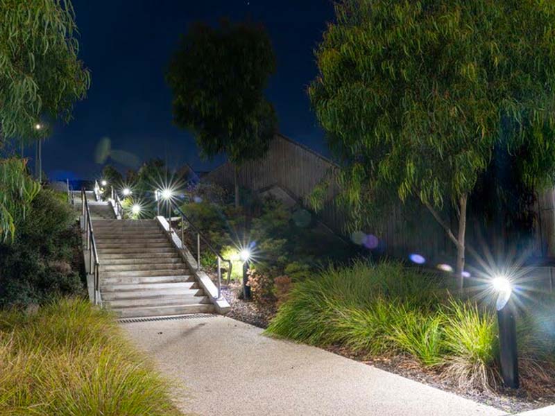 River Valley Estate stairs at night illuminated by Leadsun solar bollard lights