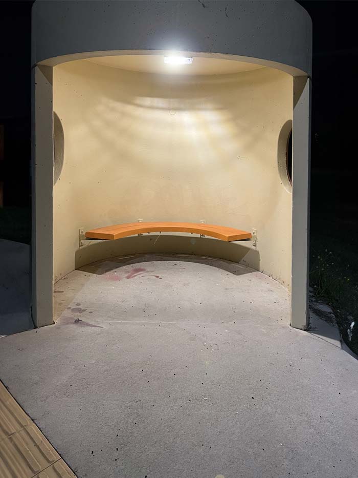 An interior view of one of the illuminated bus shelters.